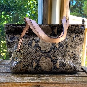 Michael Kors snake skin pattern purse.